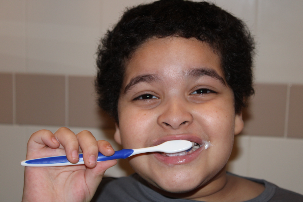 Brushing-Teeth student learning to brush teeth