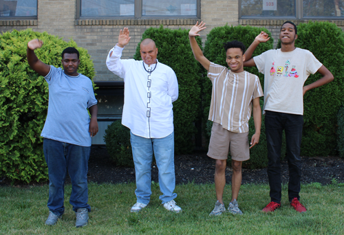 Outside-School-Option-2 The Gateway School students waving and happy