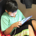 young student at the gateway school using the ipad for special education program